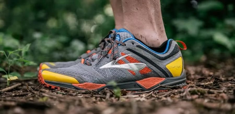 The Rise of Trail Running Shoes in Streetwear: Why Salomon, Hoka, and Merrell Are Dominating the Moment